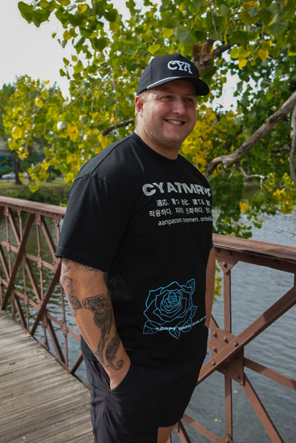 NEW BEGINNING "PLANTED" OVERSIZED UNISEX TEE IN BLACK