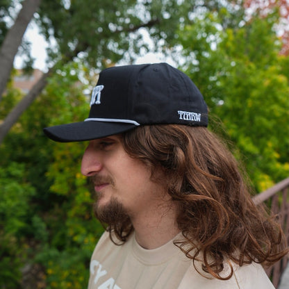 NEW BEGINNING "NO WORDS" 5 PANEL HAT IN BLACK