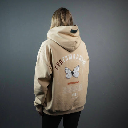 NEW BEGINNING "FLY AWAY" UNISEX HOODIE IN SAND